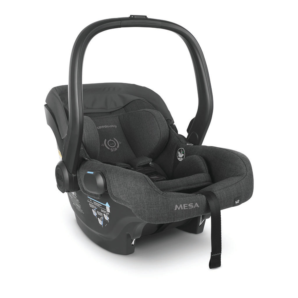 Right view of mesa v2 carseat in color greyson with handle up and canopy down.