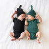 twins wearing KyteBaby knotted caps