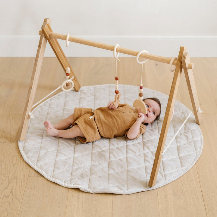 The Saranoni Minky Play Mat in Moonbeam supports calm, grounded floor time as Play mats for toddler moments.