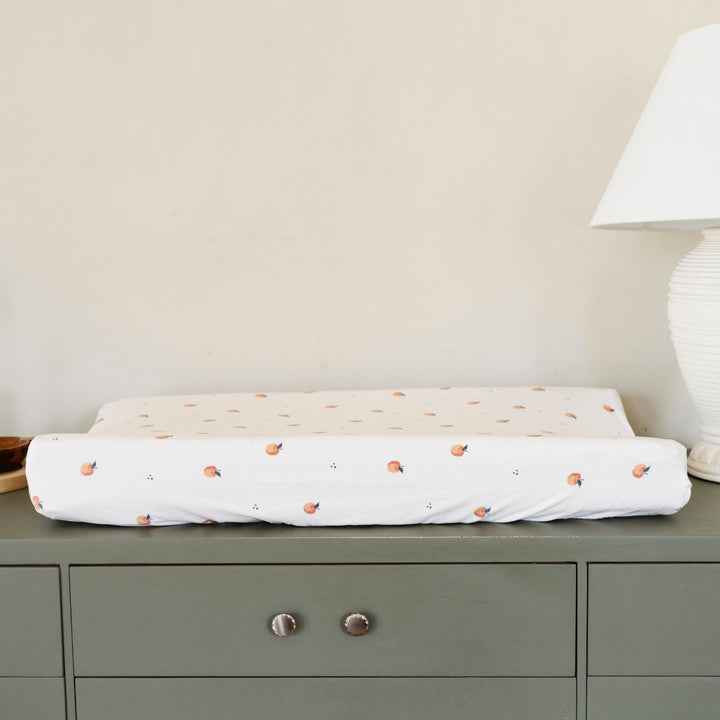 Saranoni Minky Stretch Luxe Changing Covers in Apple feel velvety and transform everyday changing pads into a calming cozy experience