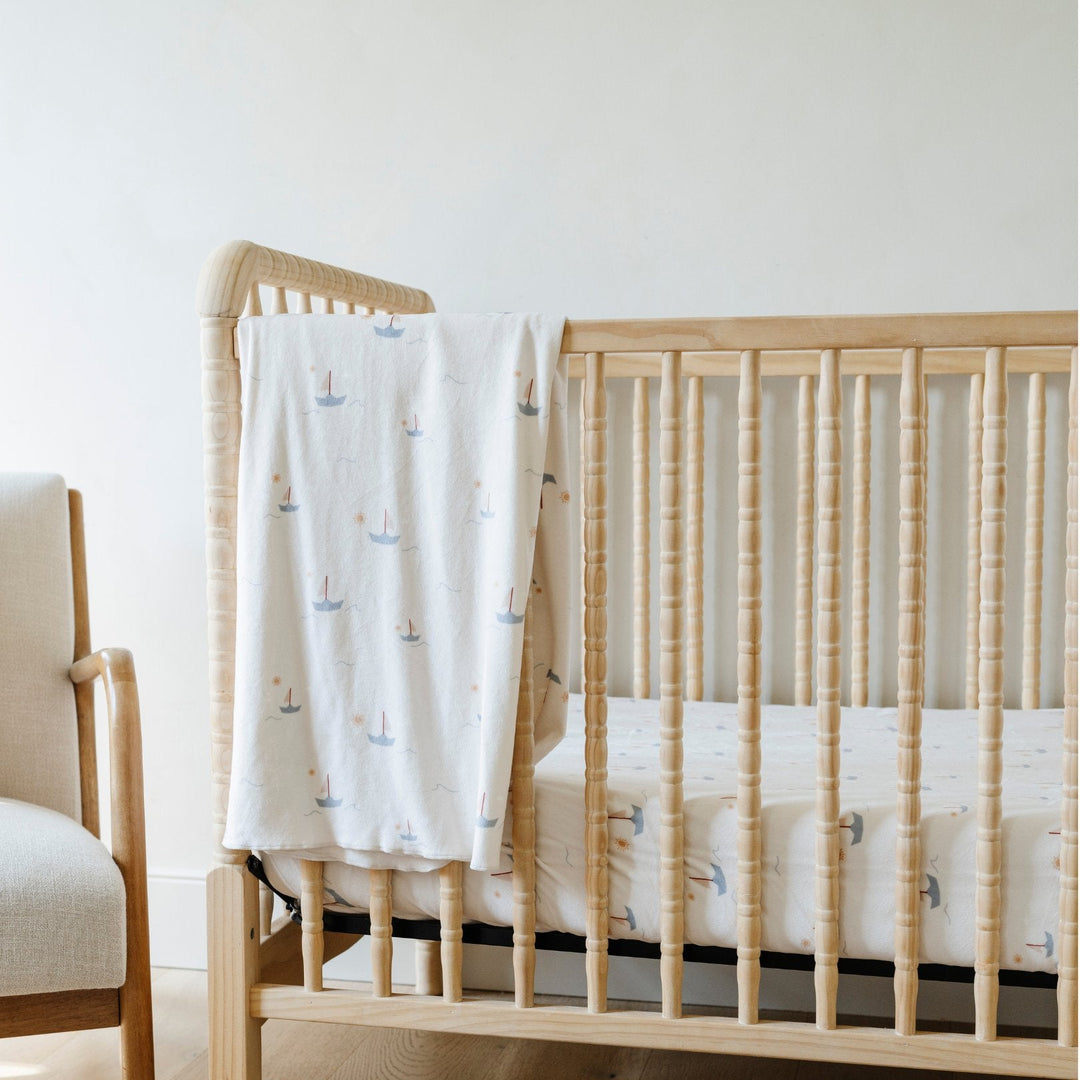 Soft Sail Boat Saranoni Minky Stretch Luxe Crib Sheets bring comfort as fitted sheets for baby crib.