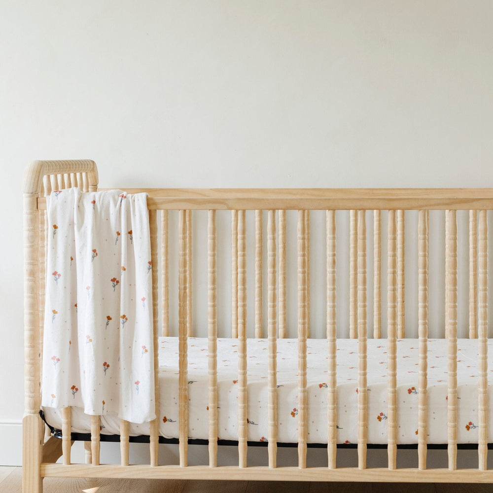 Wrap your little one in Floral Saranoni Minky Stretch Luxe Crib Sheets, the best crib sheets for sleep.