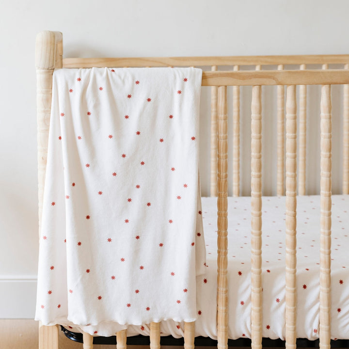 Give your baby comfort with the Stars Saranoni Minky Stretch Luxe Crib Sheets, premium sheets for baby crib.