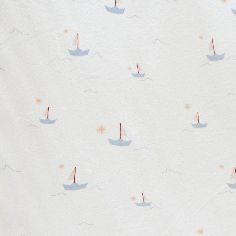 The Saranoni Minky Stretch Luxe Swaddle/Blanket in Boats creates cozy warmth and is a must-have for baby boy blankets.