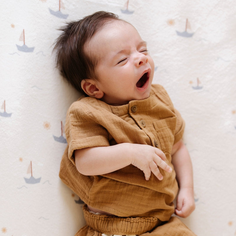 Saranoni Minky Stretch Luxe Swaddle/Blanket in Sail Boat delivers plush softness and works beautifully as a toddler blanket.