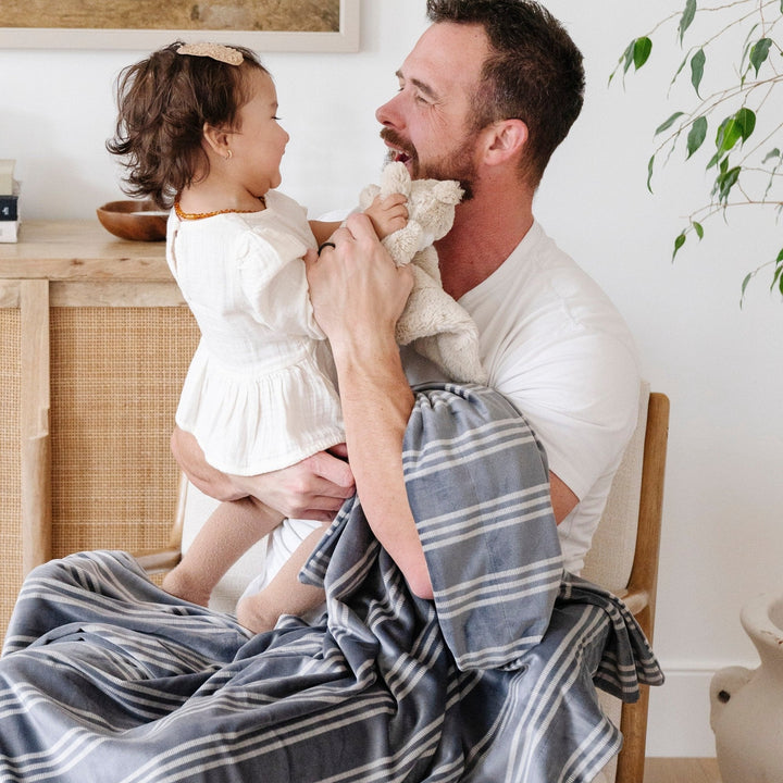 The Saranoni Minky Stretch Receiving Blanket in Stripe brings gentle softness, perfect for daily use as a baby boy blanket.