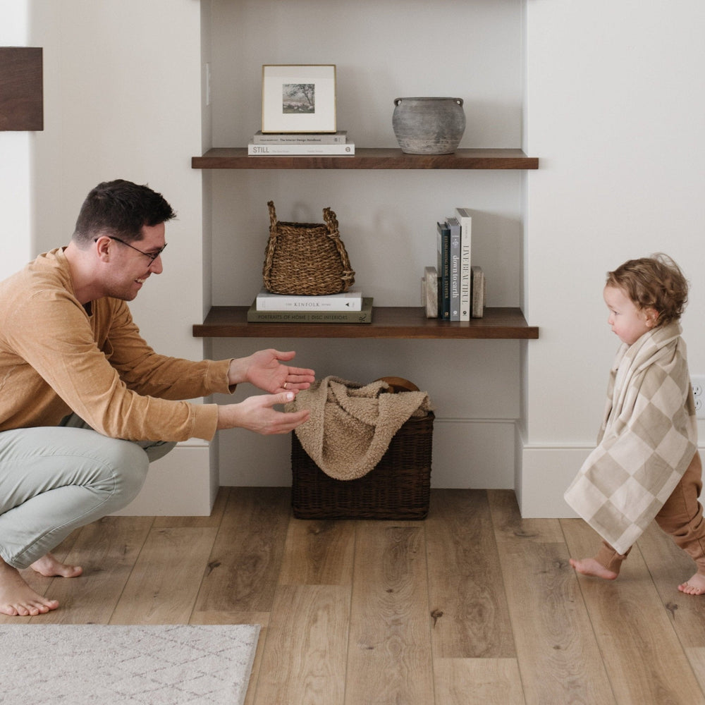 SaranoniÕs Minky Stretch Receiving Blanket in Neutral Checkered offers plush softness that makes it one of the best baby blankets around.