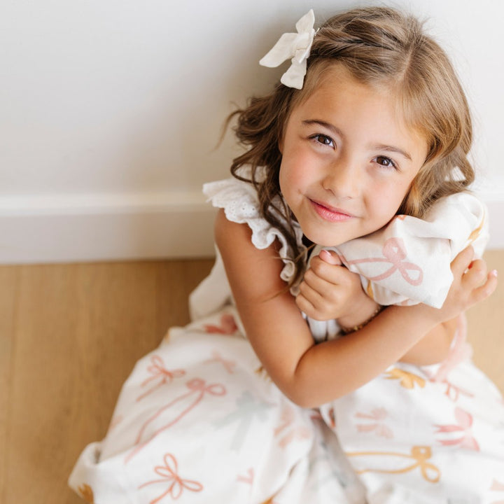 Keep baby warm with Bows Saranoni Minky/Lush Receiving Blanket, a soft baby blanket ideal for snuggles.