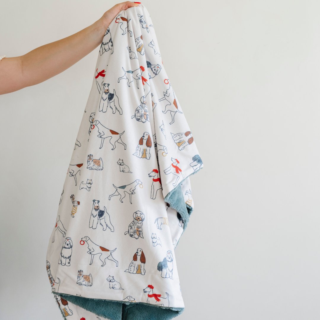 Dogs Saranoni Minky/Lush Receiving Blanket delivers soft baby blankets for comfort and style in the nursery.