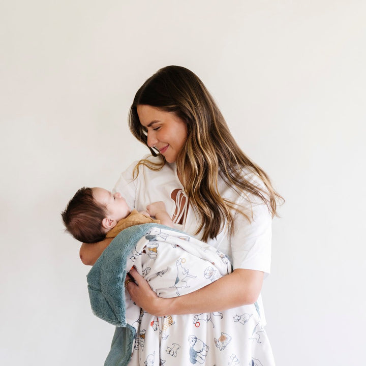 Dogs Saranoni Minky/Lush Receiving Blanket wraps baby in soft baby boy blankets for everyday use.