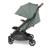 Side view of Gwen Minu V2 stroller with canopy.