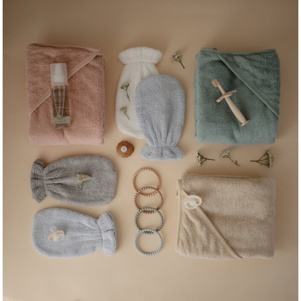 Mushie Hooded Towels for Infants offering a stylish and practical solution for bath time