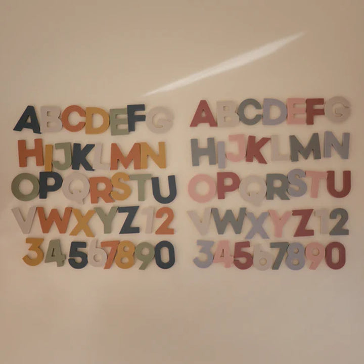 Mushie foam bath letters and numbers close-up - BPA-free EVA foam pieces that stick to bath surfaces