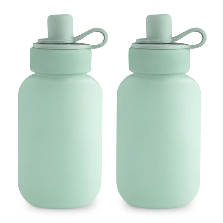 Mushie silicone puree pouch 2-pack in Cambridge Blue by Uppababy, made from BPA free material for safe feeding on the go.