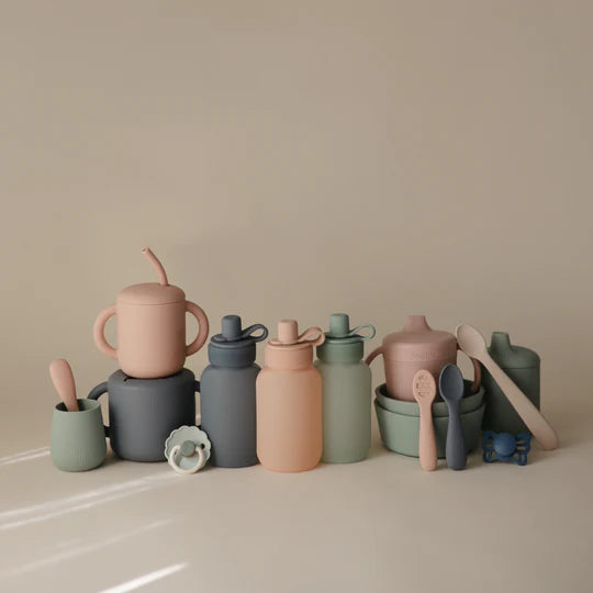 Feeding time with Uppababy mushie silicone puree pouch set in Blush, made from BPA free silicone.