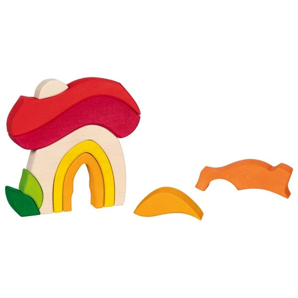 Wooden toy stacking toy by Goki evolution with a red mushroom cap
