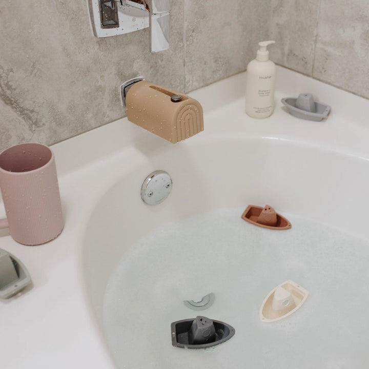 Mushie Faucet Cover Natural Natural-colored Mushie faucet cover offering bath time safety and protection for your babyÕs delicate skin