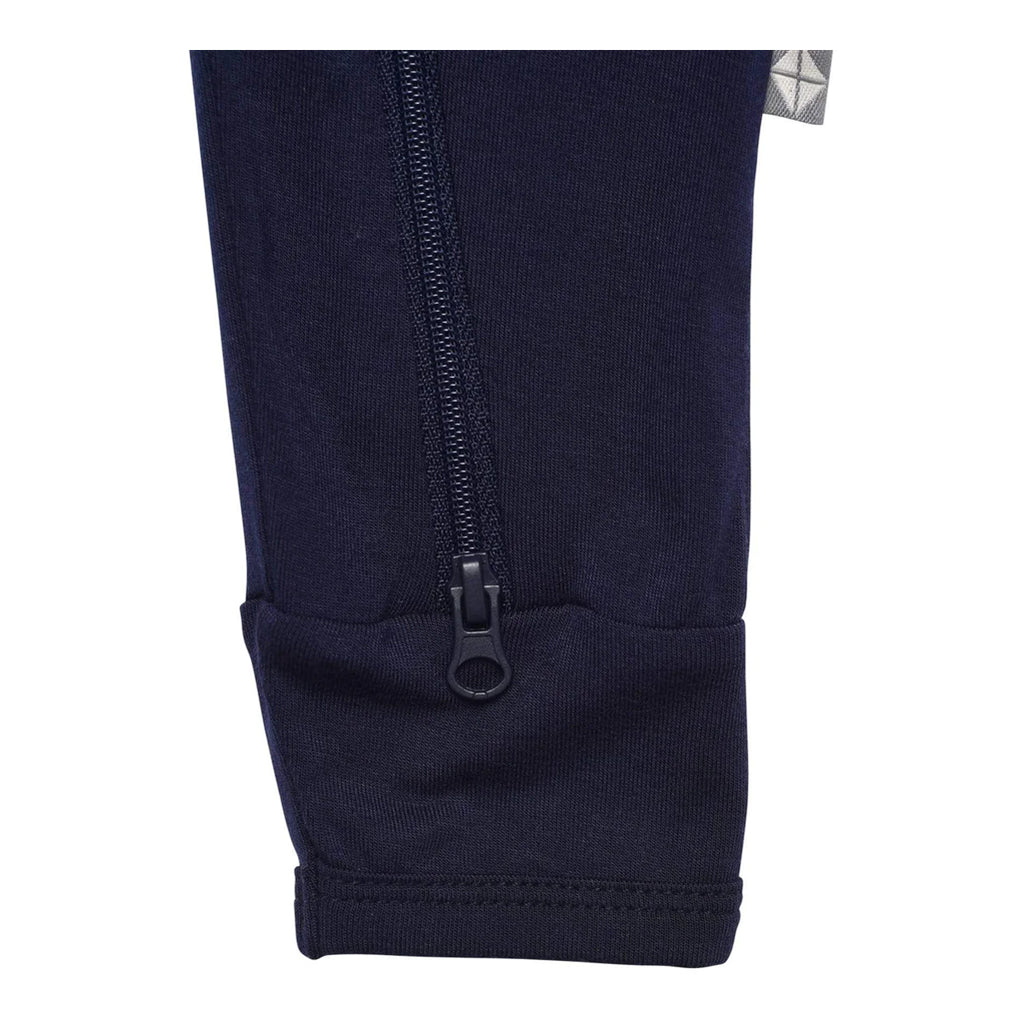 Close up on the foot of the Kyte Zipper Romper in the color Navy.