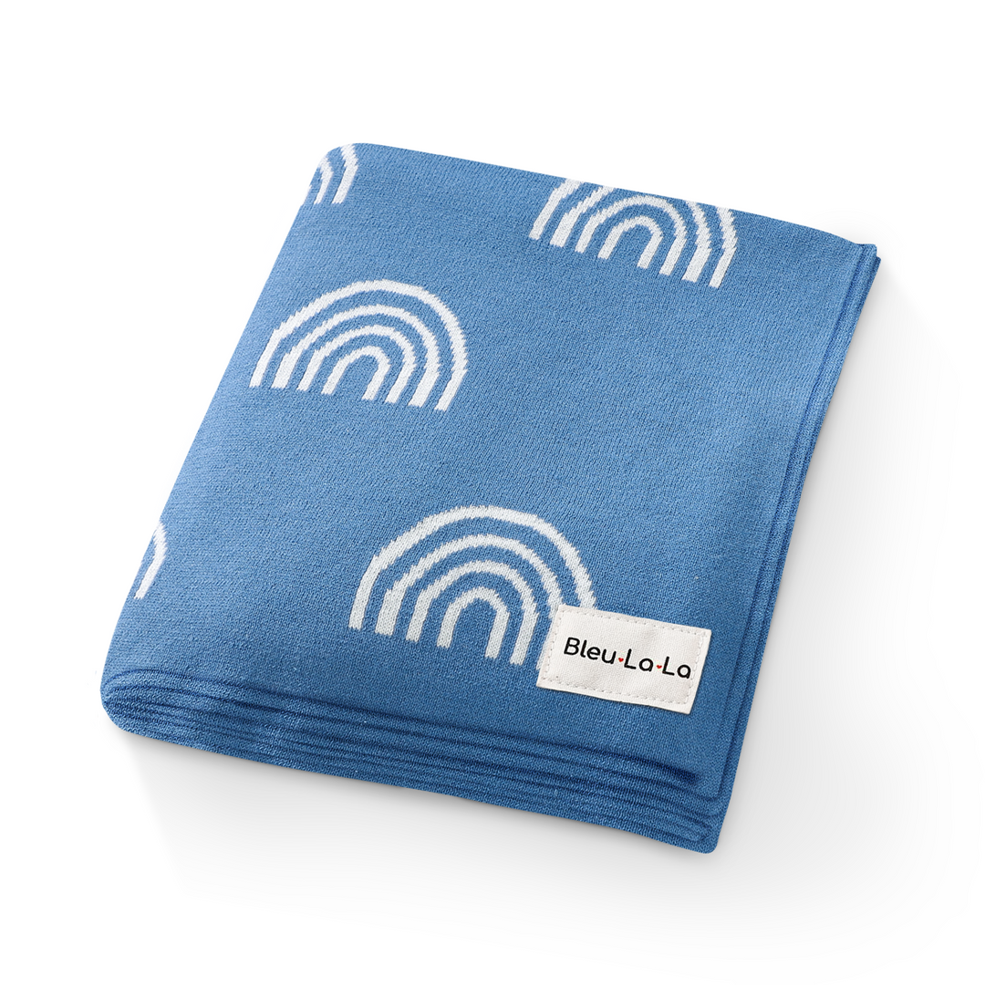 Picture of the warm, folded Bleu La La Rainbow Blanket in Blue 
