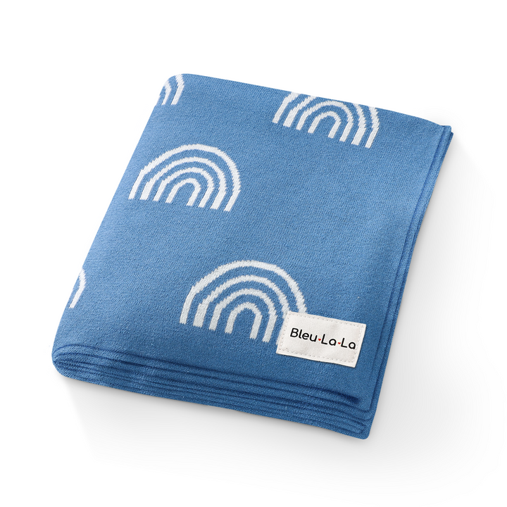 Picture of the warm, folded Bleu La La Rainbow Blanket in Blue 