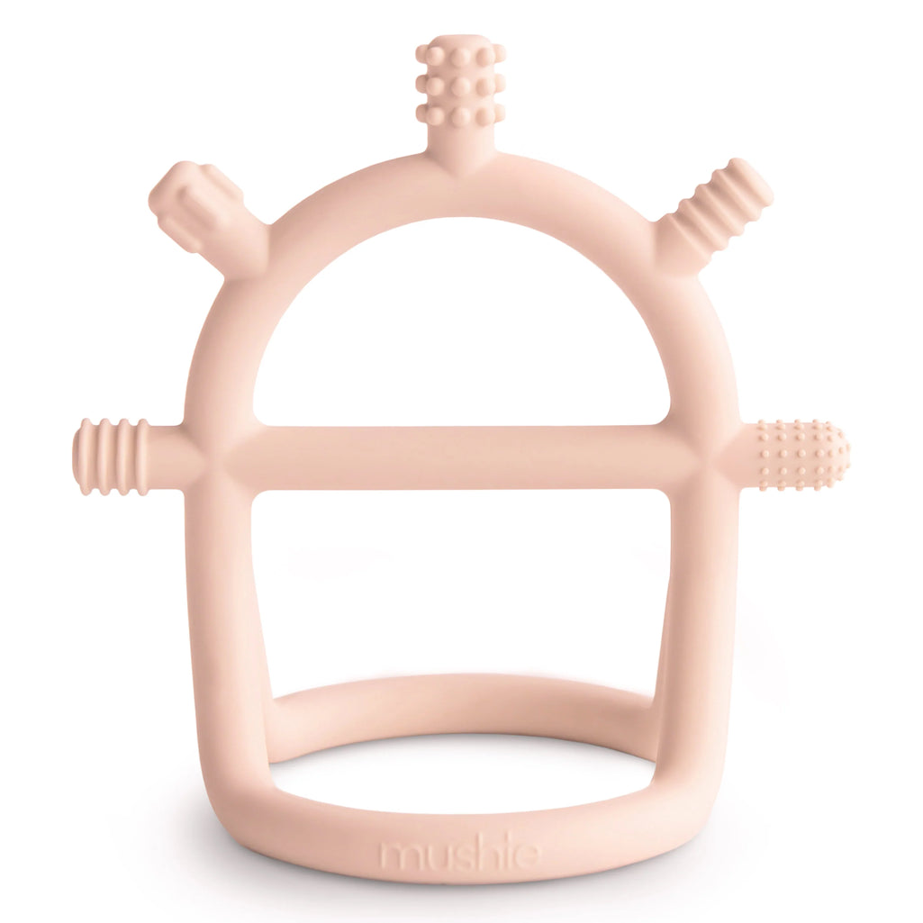 Mushie no-drop teether toy in blush pink