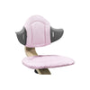 pink cushion on stokke nomi counter high chairs