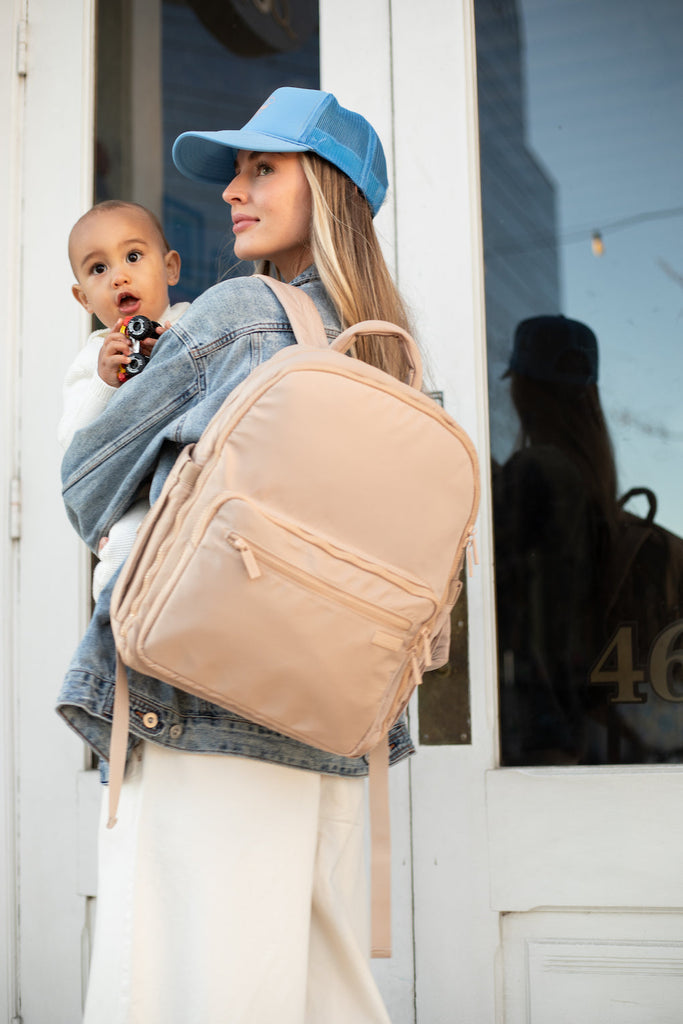 mom carrying child and fawn design nylon diaper bag