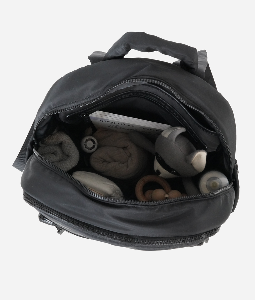 Inside of the Main Pocket of Fawn Design Nylon Diaper Pack in Black