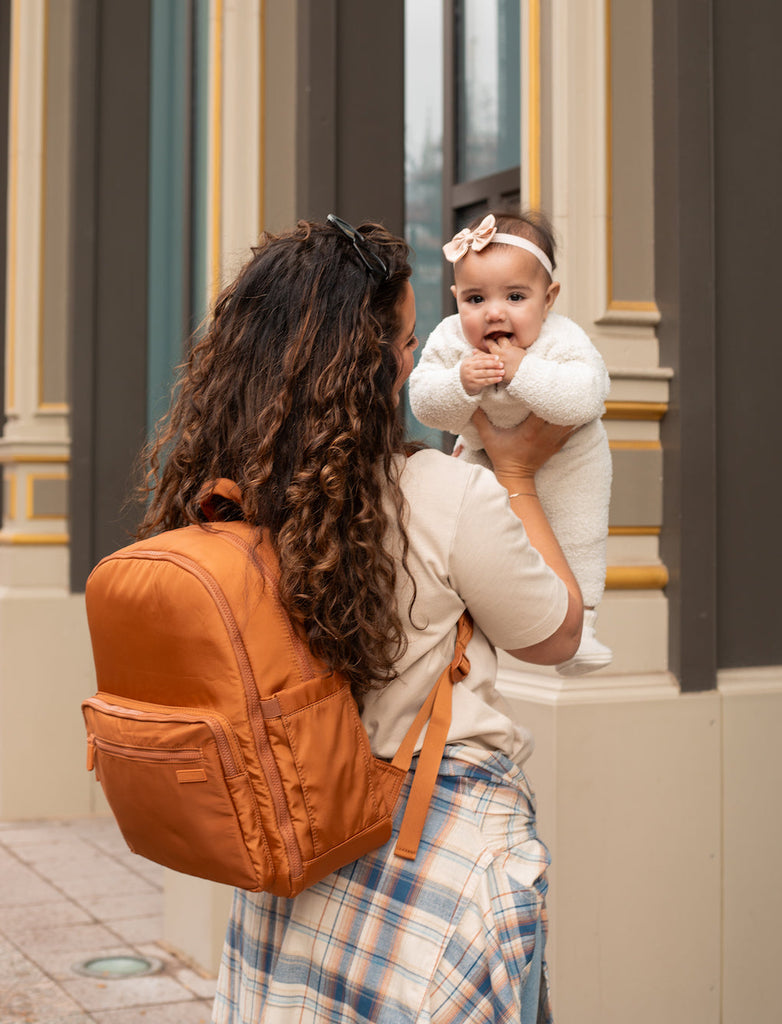  photo of the Fawn Design The Nylon Diaper Pack in Brown the best diapering backpack with extra storage