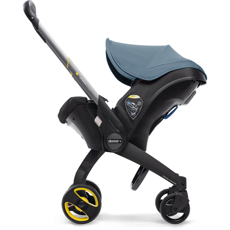 doona stroller and new born car seat in blue