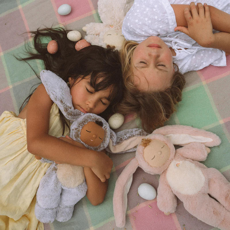 kids holding ollie ella cozy dinkums stuffed rabbit dolls 