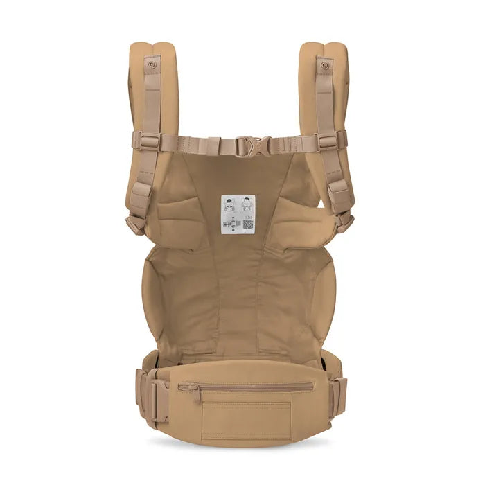 The Ergobaby Omni Deluxe Camel offers a cozy, breathable solution as a best baby carrier for newborn outings.