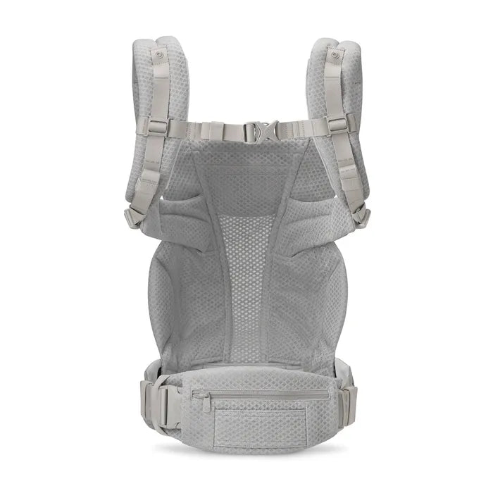 Shown in Pearl Grey, the Ergobaby Omni Deluxe combines elegant style and comfort in this newborn baby carrier.