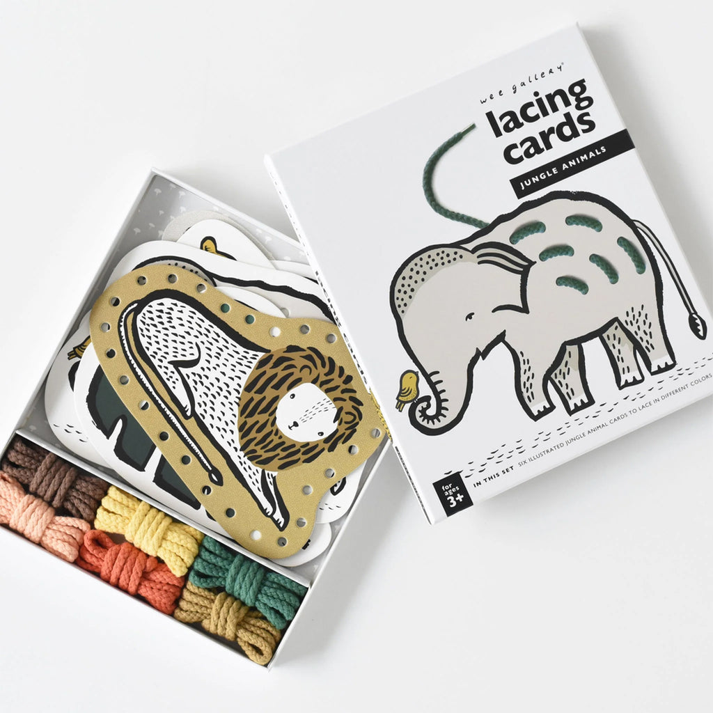 Contents of jungle animal lacing card set by wee gallery