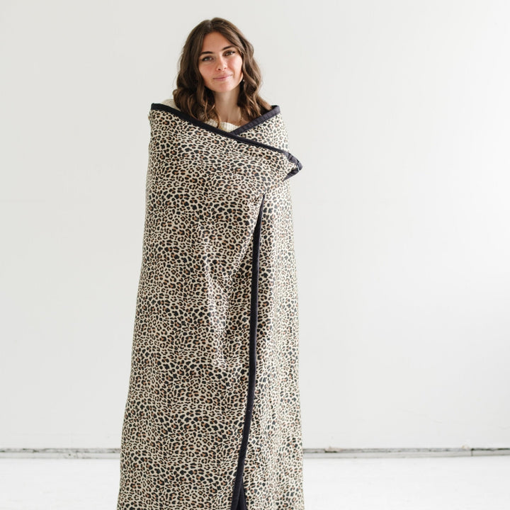 Saranoni Outdoor Blanket in Leopard keeps baby boys snug, a top pick for a soft baby blanket.