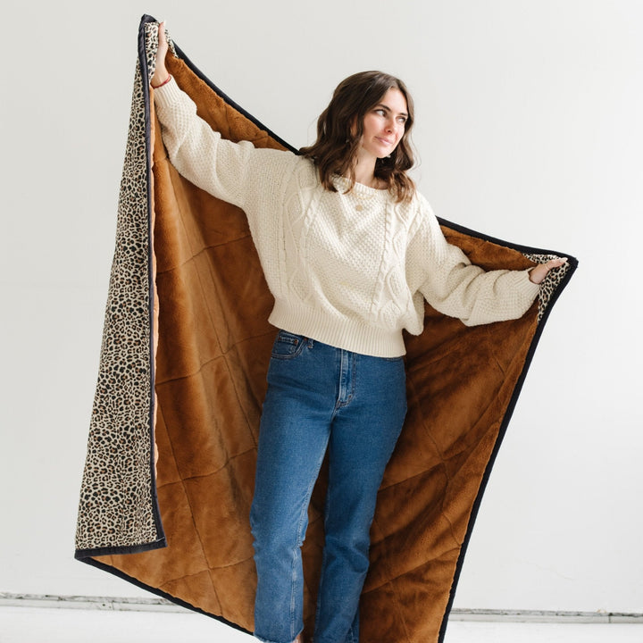 Enjoy picnics or park days with Saranoni Outdoor Blanket in Leopard, a versatile outdoor throw blanket.