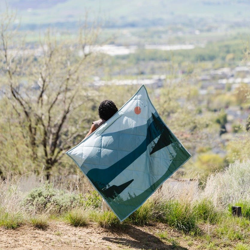 Soft comfort awaits with Saranoni Outdoor Blanket in Glacier, ideal for baby girl blankets on the move.