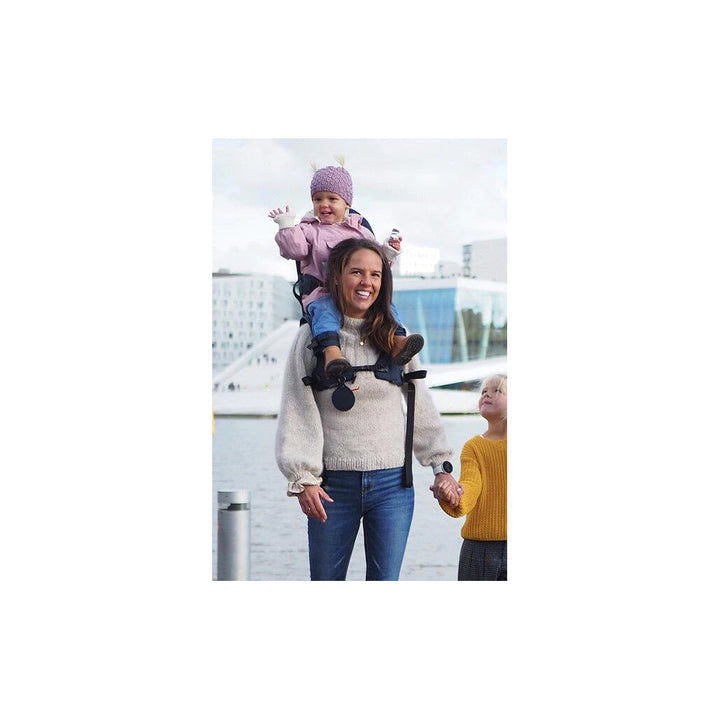 The navy shoulder carrier being used outside
