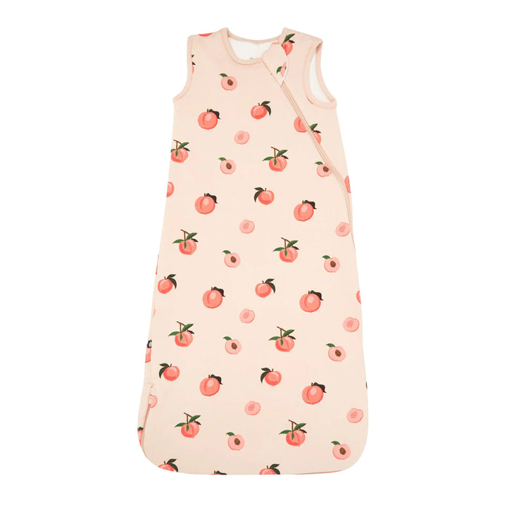 Peach tones in the Kyte Baby Sleep Sack Tog 1.0 create a soothing newborn sleep sack