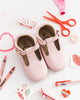 Pink t-bar leather shoes made by Little Love Bug company