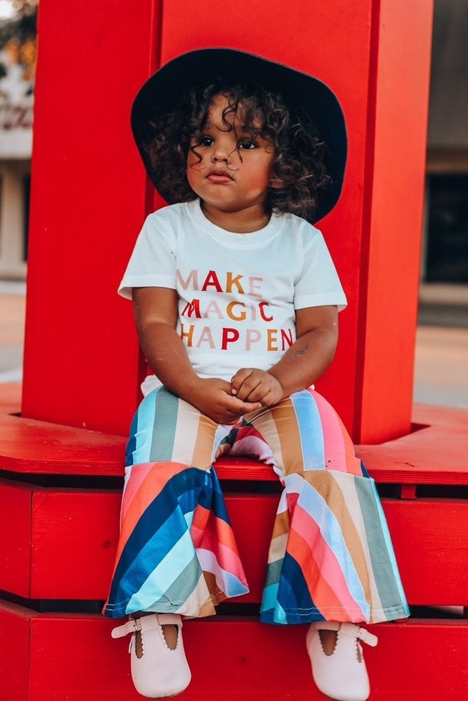 Little girl in a pair of pink Little Love Bug Company t-bar shoes.