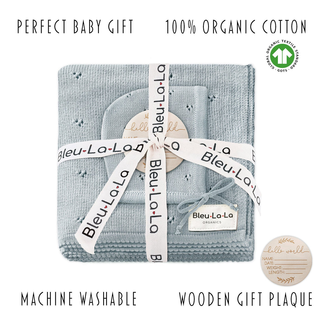 Bleu La La Organic Pointelle Swaddle Blanket + Hat Gift Set in powder blue displayed folded with ribbon, highlighting organic cotton gift set.