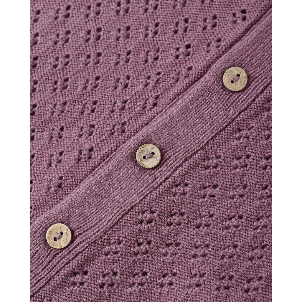 close up of buttons on quincy mae mulberry bubble baby romper 