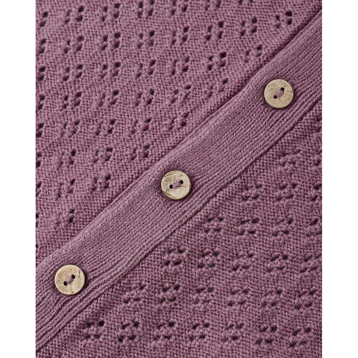 close up of buttons on quincy mae mulberry bubble baby romper 