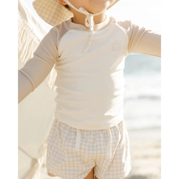 quincy mae neutral oat swim baby rash guard 
