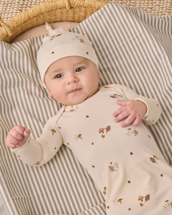 Studio photo of the Quincy Mae Woodland Gown + Hat Set, soft stretchy newborn gown