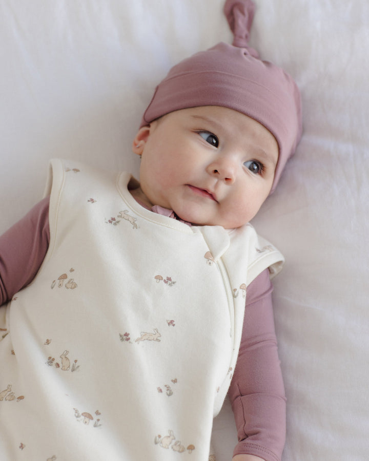 Bamboo newborn knotted hat in Mulberry, Quincy Mae lifestyle image