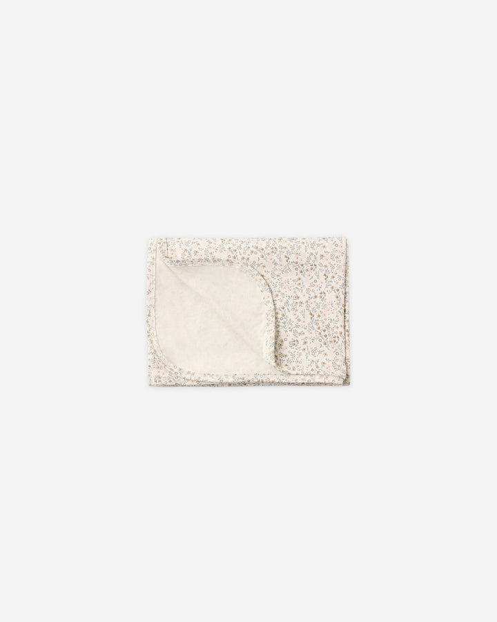 Quincy Mae Bamboo Swaddle in Bloom floral print on natural, soft stretchy baby swaddle blanket