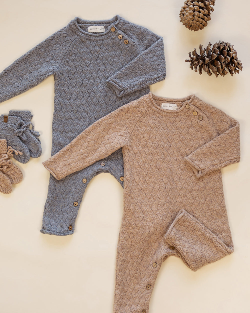 Heathered Slate knit baby jumpsuit by Quincy Mae styled flat lay outfit