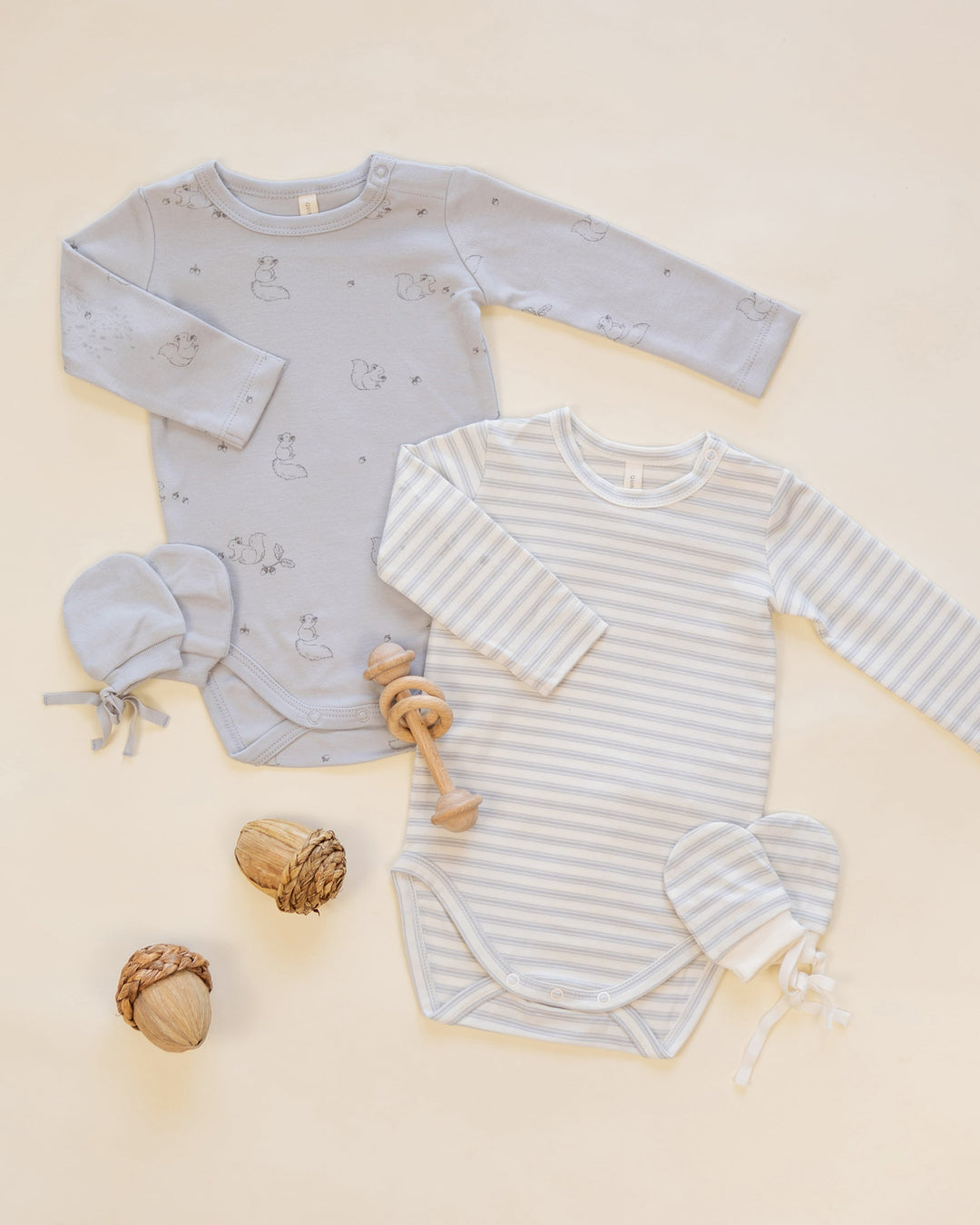 Styled flat lay with Quincy Mae Cloud Stripe no scratch baby mittens